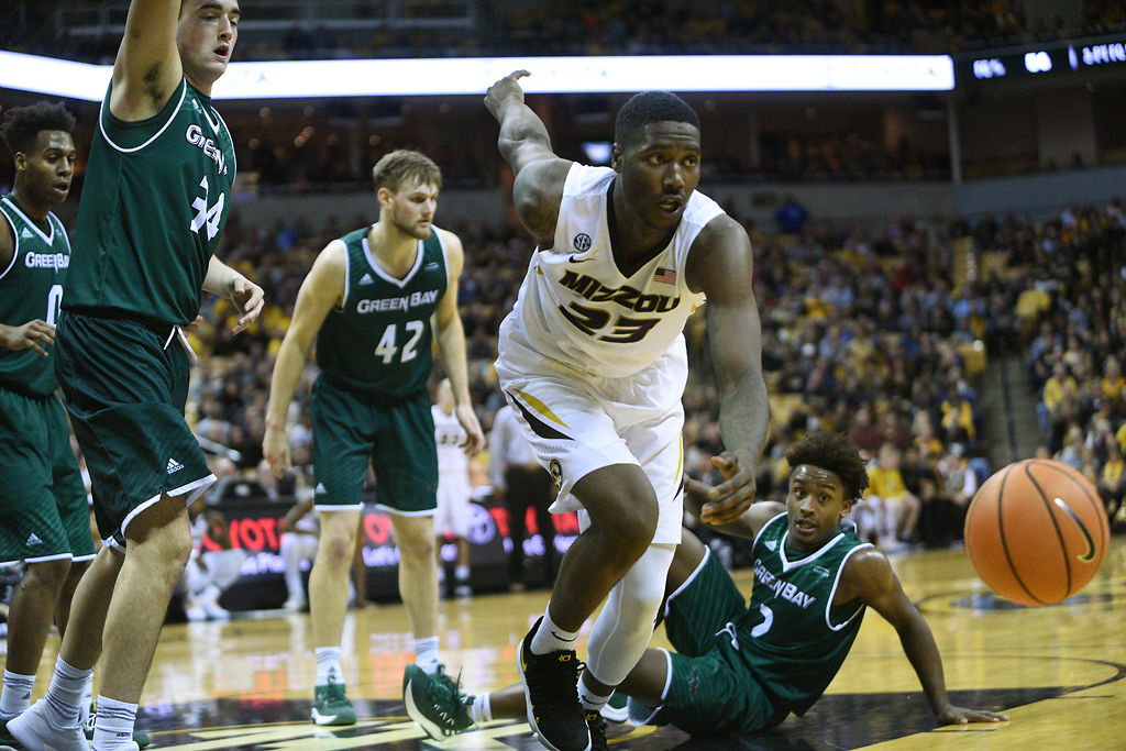 Jeremiah Tilmon chases after the ball